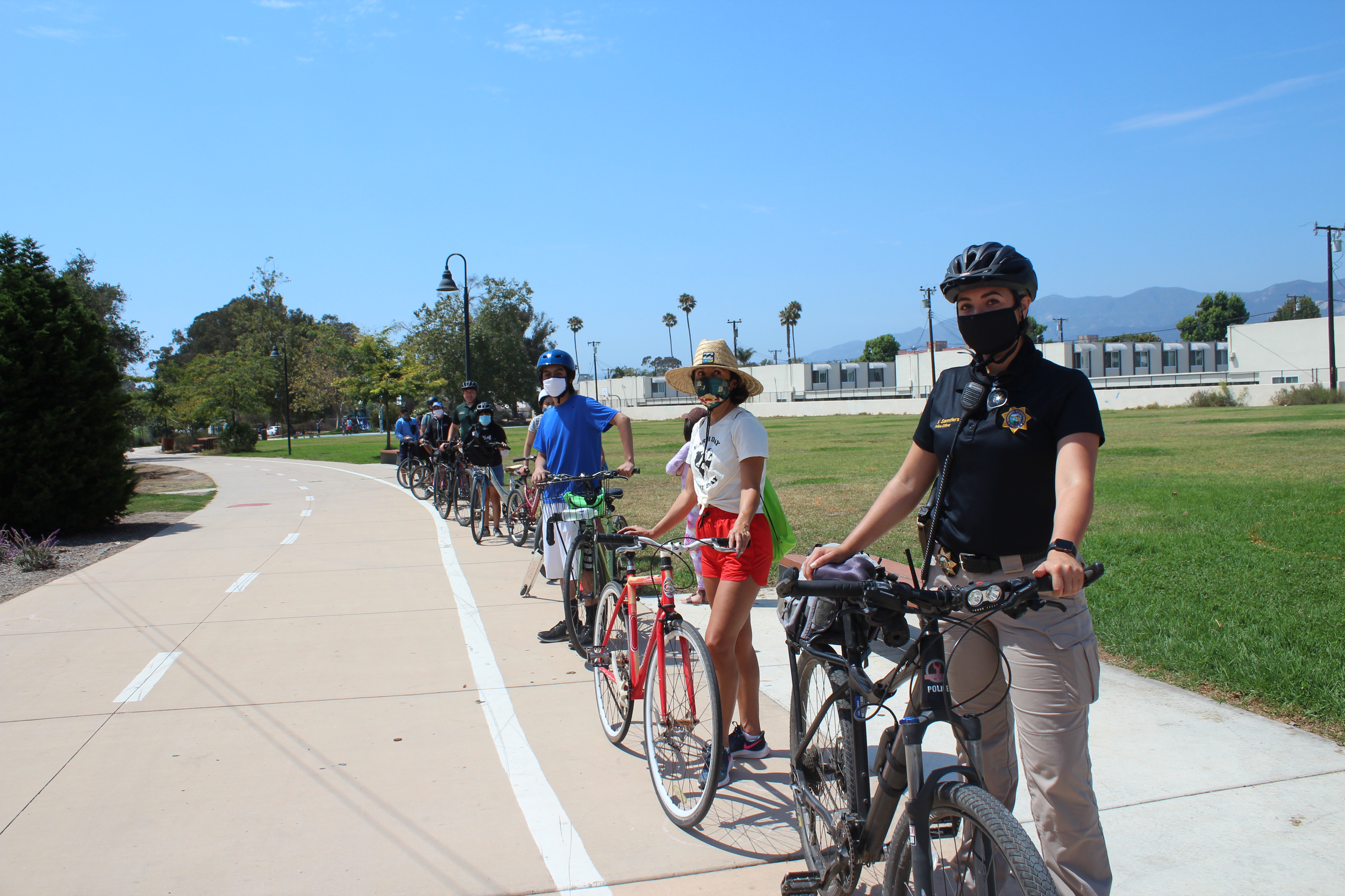 Officer Saunders leading the socially distanced bike ride